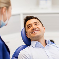 Woman smiling in the dental chair